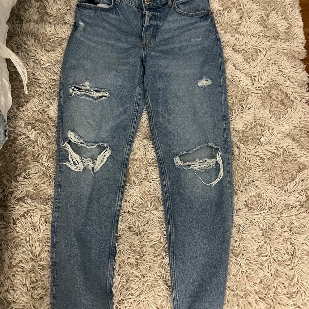 Dark washed distressed jeans